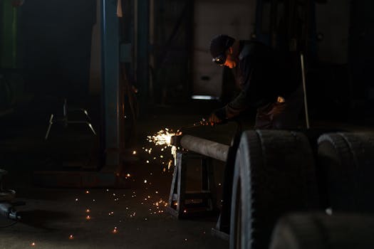 plumber working on a pipe