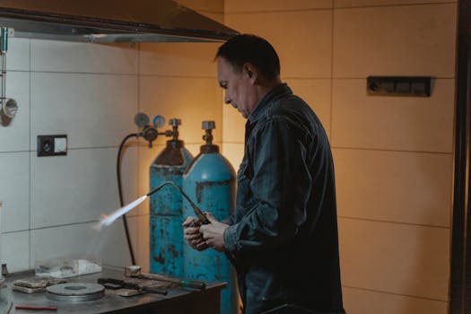 plumber working on a pipe