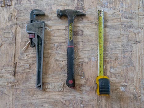 plumbing tools on a workbench