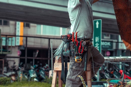 plumber working on a pipe